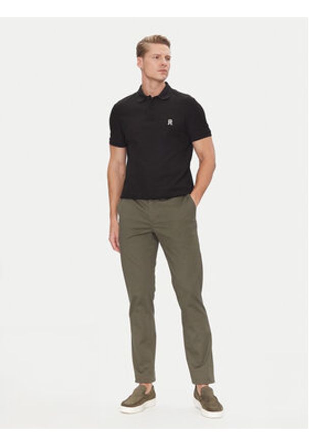 TOMMY HILFIGER - Tommy Hilfiger Polo MW0MW33167 Czarny Regular Fit. Typ kołnierza: polo. Kolor: czarny. Materiał: bawełna