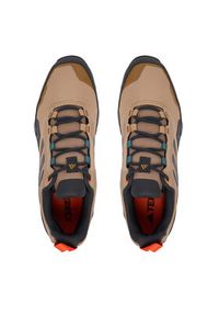 Adidas - adidas Trekkingi Terrex Eastrail 2 JR2710 Brązowy. Kolor: brązowy. Materiał: materiał. Model: Adidas Terrex. Sport: turystyka piesza