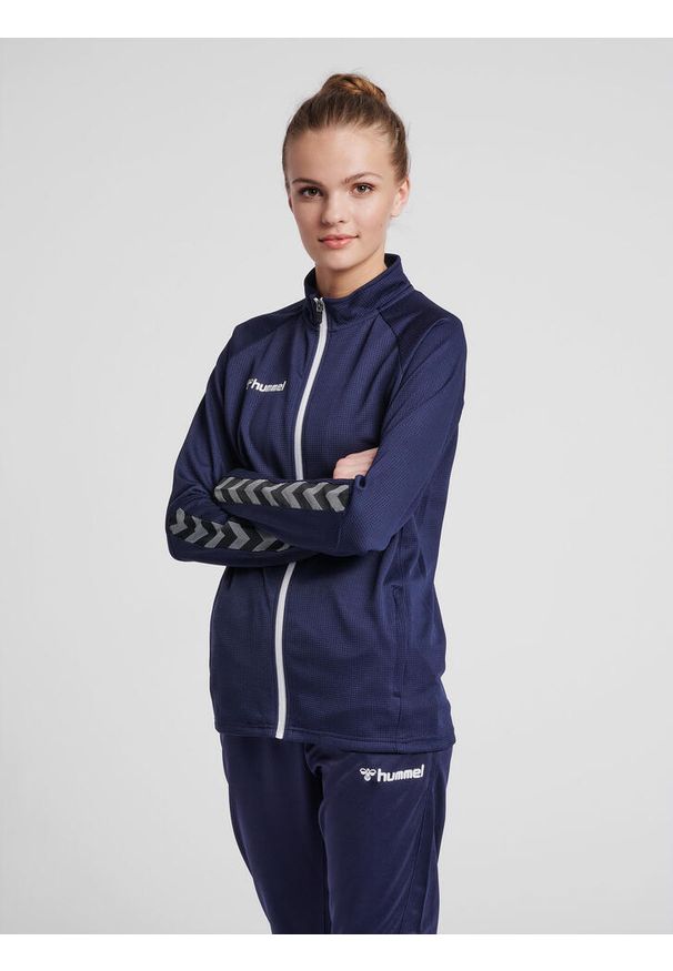 Kurtka damska Hummel Zip hmlAUTHENTIC Poly. Kolor: niebieski. Materiał: poliester. Sport: fitness