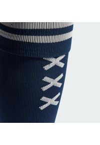 Adidas - Getry piłkarskie Ajax Amsterdam 23/24. Kolor: niebieski. Materiał: materiał. Sport: piłka nożna
