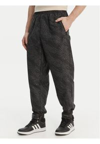 Adidas - adidas Spodnie dresowe PrimeLift Workout KA1202 Szary Loose Fit. Kolor: szary. Materiał: syntetyk #1