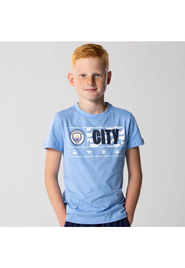 MANCHESTER CITY - Koszulka dziecięca Man City jasnoniebieska. Kolor: niebieski. Sezon: lato. Sport: piłka nożna