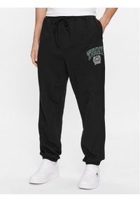 Tommy Jeans Spodnie dresowe College Graphic DM0DM16772 Czarny Relaxed Fit. Kolor: czarny. Materiał: bawełna, dresówka
