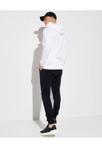 Balmain - BALMAIN - Biała rozpinana bluza z logo. Kolor: biały. Materiał: bawełna, prążkowany. Długość rękawa: długi rękaw. Długość: długie. Wzór: nadruk