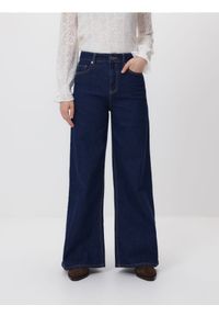 Reserved - Jeansy wide leg - granatowy. Kolor: niebieski