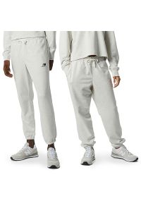 Spodnie New Balance UP21500SAH - szare. Kolor: szary. Materiał: materiał, dresówka. Sport: fitness
