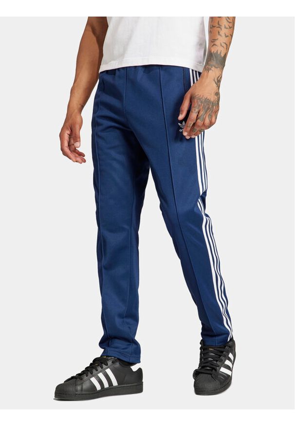 Adidas - adidas Spodnie dresowe adicolor Classics Beckenbauer IP0421 Niebieski Slim Fit. Kolor: niebieski. Materiał: syntetyk, bawełna