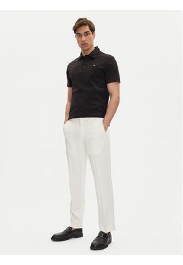 Emporio Armani Polo EM000571 AF12331 UC001 Czarny Regular Fit. Typ kołnierza: polo. Kolor: czarny. Materiał: bawełna