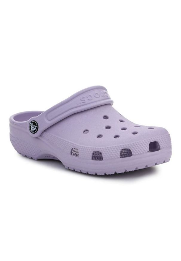 Klapki Crocs Classic Kids Clog 206991-530 fioletowe. Okazja: na plażę, na co dzień. Kolor: fioletowy. Materiał: syntetyk. Styl: casual, klasyczny, wakacyjny