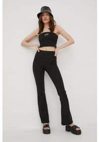 Tommy Jeans spodnie damskie kolor czarny dzwony high waist. Stan: podwyższony. Kolor: czarny. Materiał: poliester. Wzór: aplikacja #4