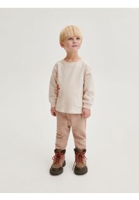 Reserved - Strukturalne spodnie z kieszeniami - brązowy. Kolor: brązowy. Materiał: bawełna, dzianina #1
