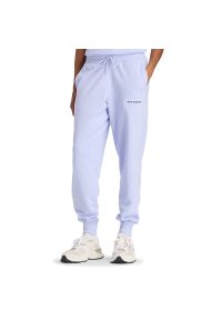 Spodnie damskie New Balance WB61D3EADYK - fioletowe. Stan: podwyższony. Kolor: fioletowy. Materiał: poliester, bawełna, dresówka #1