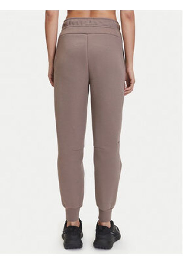 Nike Spodnie dresowe Tech Fleece HV6779 Brązowy Regular Fit. Kolor: brązowy. Materiał: bawełna