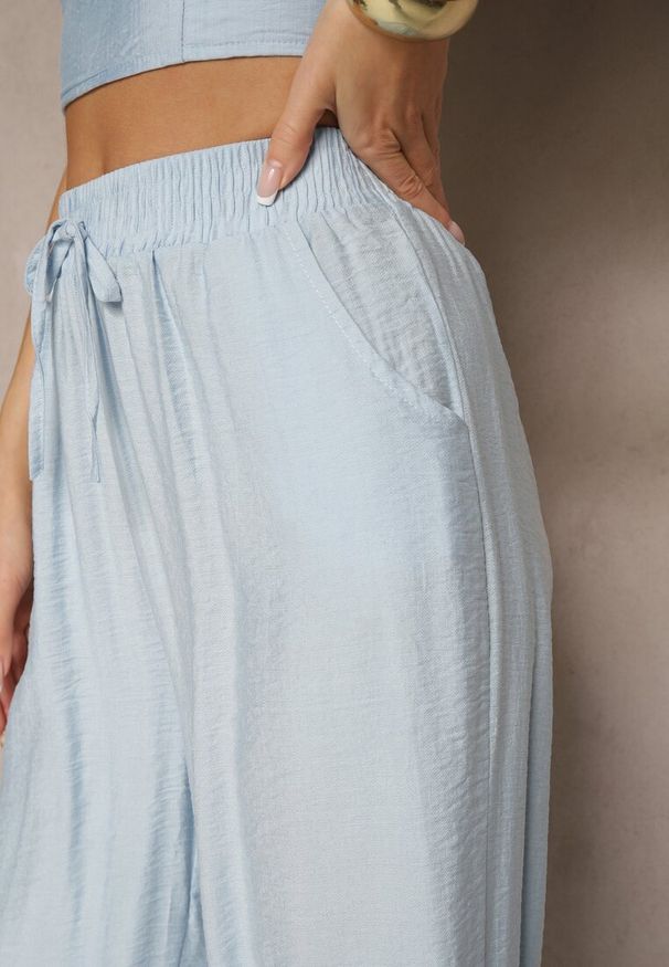 Renee - Niebieskie Szerokie Spodnie High Waist z Wiskozy z Gumką w Talii Lannalie. Okazja: na co dzień. Stan: podwyższony. Kolor: niebieski. Materiał: wiskoza. Styl: elegancki, casual