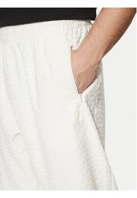 Adidas - adidas Spodnie dresowe Monogram Track JP4429 Biały Regular Fit. Kolor: biały. Materiał: syntetyk #3