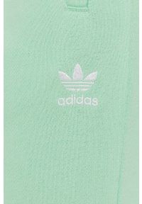 adidas Originals Spodnie damskie kolor zielony gładkie. Kolor: zielony. Materiał: bawełna. Wzór: gładki #3
