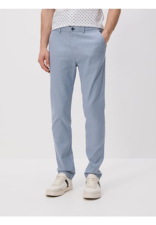 Reserved - Bawełniane spodnie chino slim - niebieski. Kolor: niebieski. Materiał: bawełna