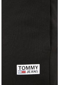 Tommy Jeans spodnie dresowe męskie kolor czarny gładkie. Kolor: czarny. Materiał: dresówka. Wzór: gładki
