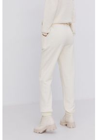 Answear Lab Spodnie damskie kolor kremowy gładkie. Kolor: beżowy. Materiał: dzianina. Wzór: gładki