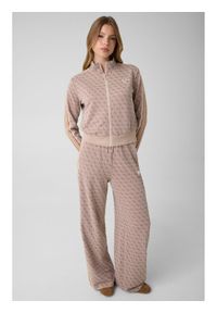 Guess Spodnie materiałowe 183095 Beżowy Slim Fit. Kolor: beżowy. Materiał: materiał #1