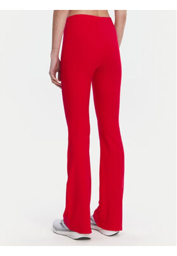 Adidas - adidas Legginsy Essentials Small Logo JD3074 Czerwony Flare Fit. Kolor: czerwony. Materiał: bawełna
