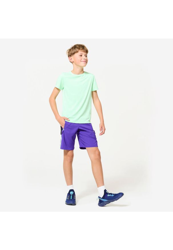 Decathlon - Spodenki sportowe dla dzieci Domyos. Kolor: zielony, czarny, wielokolorowy, fioletowy. Materiał: poliester, materiał. Styl: sportowy. Sport: fitness