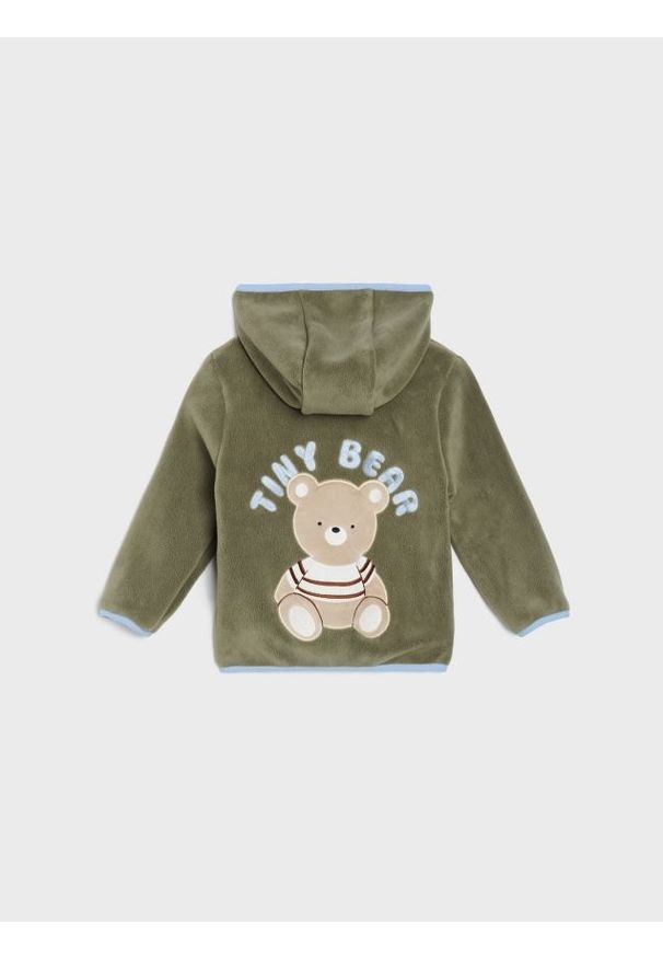 Sinsay - Puszysta kurtka z aplikacją misia na plecach - khaki. Kolekcja: plus size. Kolor: brązowy. Wzór: aplikacja