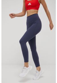adidas Performance legginsy treningowe Yoga Studio damskie kolor granatowy gładkie. Kolor: niebieski. Materiał: materiał, poliester, skóra, dzianina. Wzór: gładki. Sport: fitness