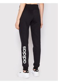 Adidas - adidas Spodnie dresowe Essentials Fleece GM5547 Czarny Regular Fit. Kolor: czarny. Materiał: bawełna, syntetyk #5