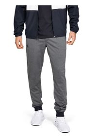 Spodnie dresowe Under Armour. Kolor: szary. Materiał: dresówka #1