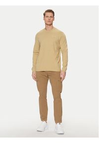 Tommy Jeans Spodnie materiałowe Austin DM0DM20281 Beżowy Regular Fit. Kolor: beżowy. Materiał: bawełna