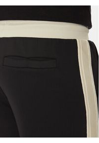 Guess Spodnie dresowe Z5YB14 KCRU2 Czarny Regular Fit. Kolor: czarny. Materiał: syntetyk #2