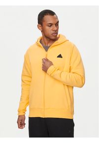 Adidas - adidas Bluza Z.N.E. Premium IR5237 Żółty Loose Fit. Kolor: żółty. Materiał: bawełna