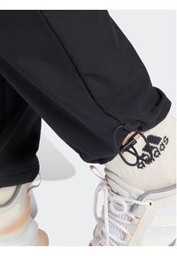 Adidas - adidas Spodnie dresowe City Escape IT8814 Czarny Regular Fit. Kolor: czarny. Materiał: syntetyk #5