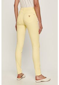 Guess - Spodnie. Kolor: żółty. Materiał: tkanina, bawełna, materiał, elastan. Wzór: gładki #2