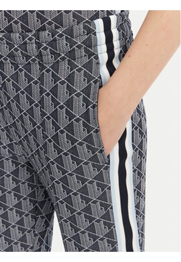 Lacoste Spodnie dresowe XF9313 Granatowy Regular Fit. Kolor: niebieski. Materiał: syntetyk, bawełna