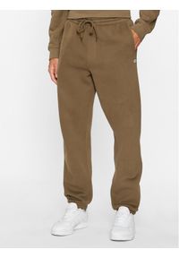 Vans Spodnie dresowe Mn Comfycush Sweatpant VN0A4OON Brązowy Relaxed Fit. Kolor: brązowy. Materiał: bawełna