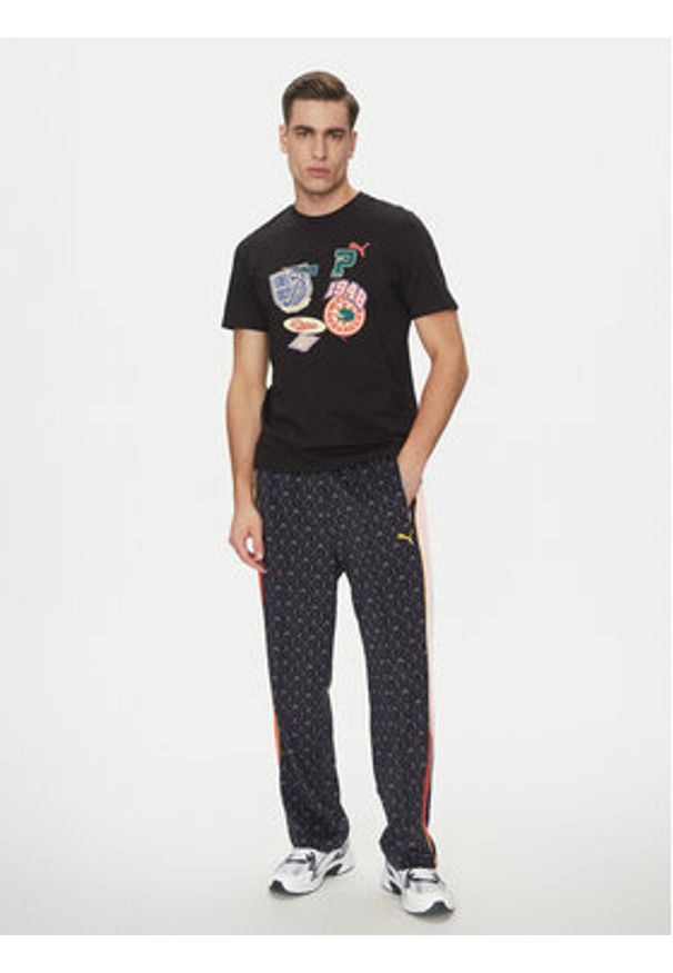 Puma Spodnie dresowe Road To Unity T7 629596 Granatowy Regular Fit. Kolor: niebieski. Materiał: syntetyk