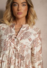 Renee - Pomarańczowa Rozkloszowana Sukienka z Wiskozą Wiązana przy Dekolcie w Roślinny Print Koriselle. Okazja: na co dzień. Typ kołnierza: dekolt w serek. Kolor: pomarańczowy. Materiał: wiskoza. Wzór: nadruk. Styl: casual, elegancki