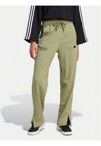 Adidas - adidas Spodnie dresowe Signature Graphic JI6524 Zielony Loose Fit. Kolor: zielony. Materiał: bawełna