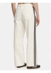 Adidas - adidas Jeansy Firebird KD2895 Beżowy Loose Fit. Kolor: beżowy #4