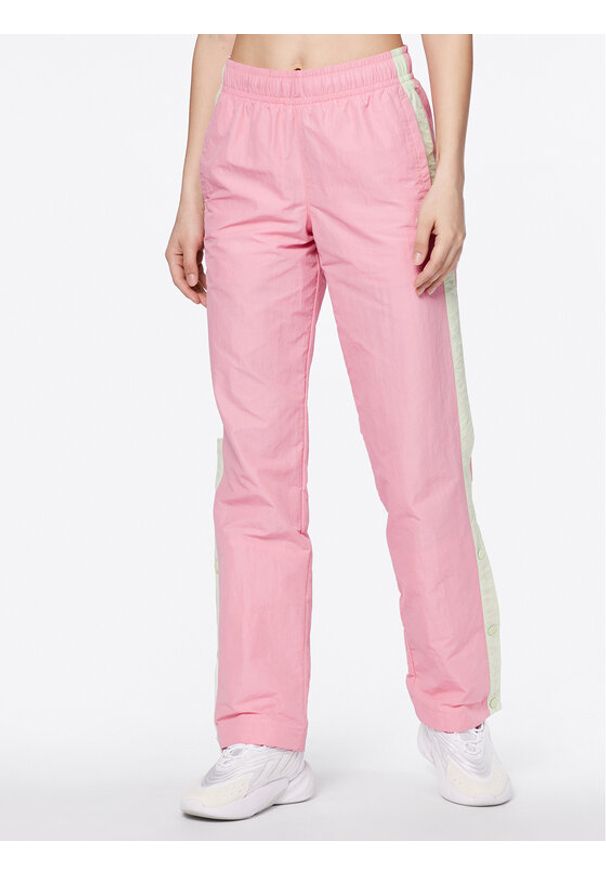 Asics Spodnie dresowe Tiger 2032C687 Różowy Relaxed Fit. Kolor: różowy. Materiał: syntetyk