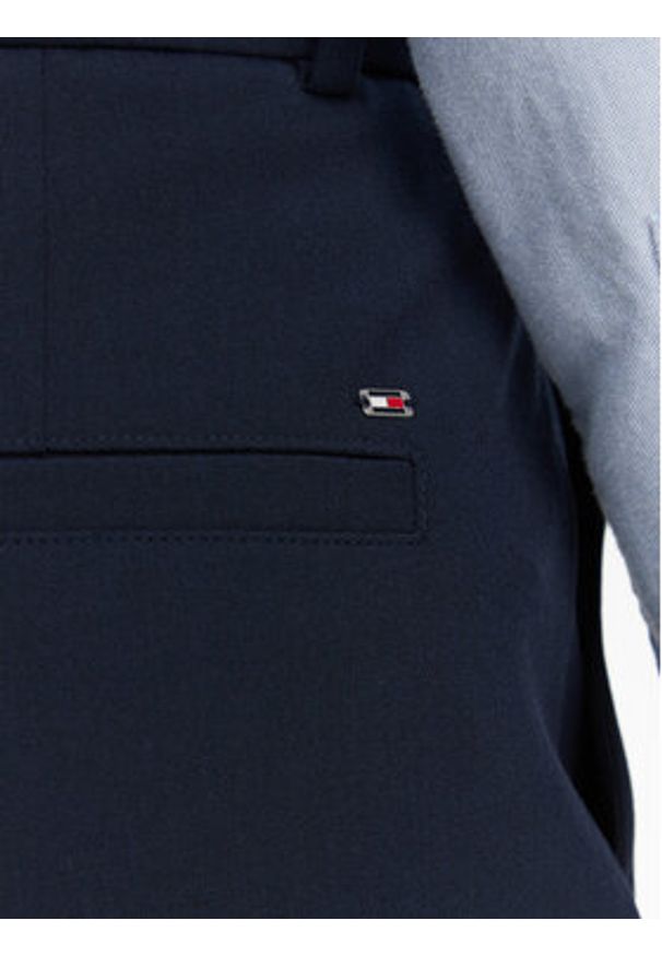 TOMMY HILFIGER - Tommy Hilfiger Chinosy WW0WW44793 Granatowy Tapered Fit. Kolor: niebieski. Materiał: syntetyk