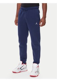 Nike Spodnie dresowe FV7277 410 Granatowy Regular Fit. Kolor: niebieski. Materiał: bawełna #1