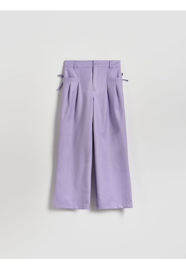 Reserved - Spodnie z kokardkami - lawendowy. Kolor: fioletowy. Materiał: tkanina