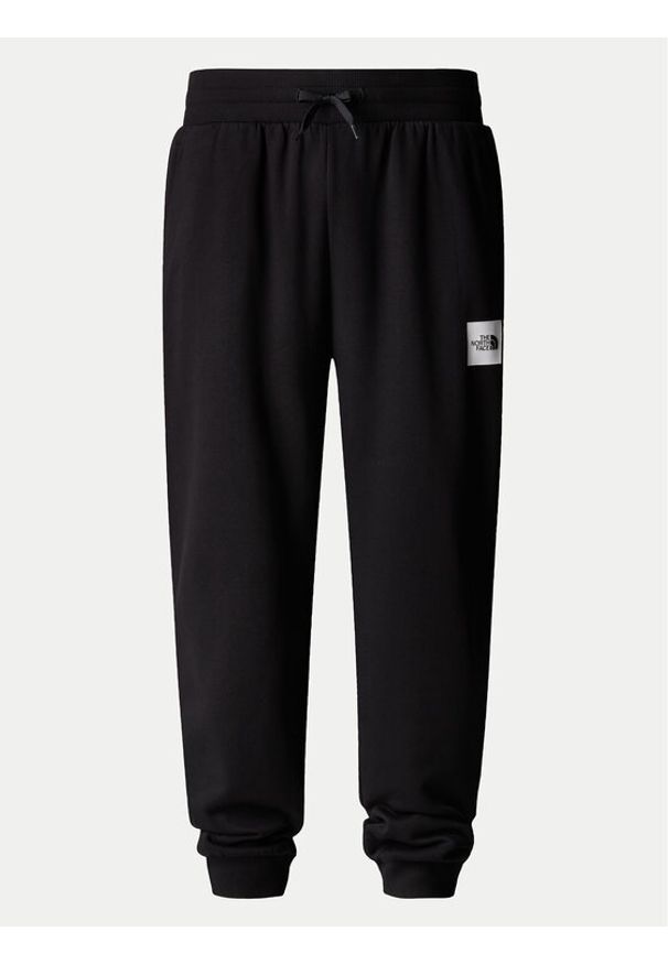 The North Face Spodnie dresowe Fine NF0A8C1K Czarny Tapered Fit. Kolor: czarny. Materiał: syntetyk, bawełna