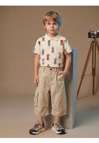Sinsay - Bawełniane jeansy wide leg 3/4 - kremowy. Kolor: kremowy #1