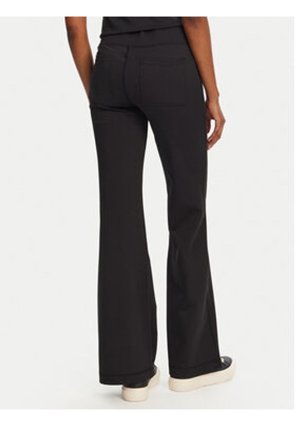 Juicy Couture Spodnie dresowe Active JCSML125403 Czarny Flared Leg. Kolor: czarny. Materiał: syntetyk
