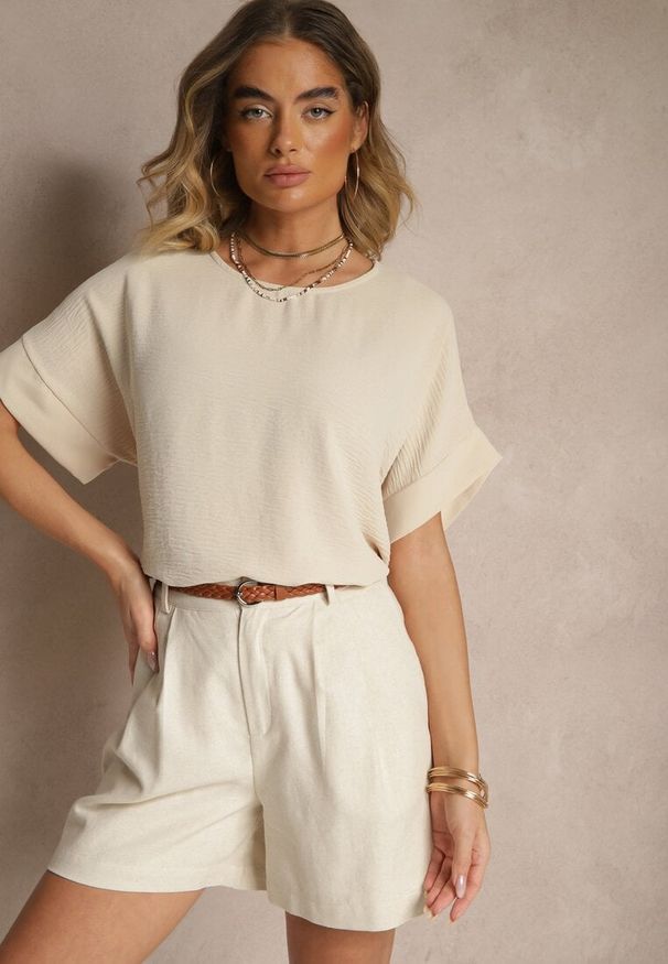 Renee - Beżowa Bluzka w Stylu Nietoperza Fadeasia. Okazja: na co dzień. Typ kołnierza: dekolt w serek. Kolor: beżowy. Styl: casual