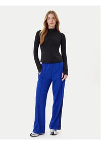 Adidas - adidas Spodnie dresowe adicolor Classic Firebird JY2693 Niebieski Loose Fit. Kolor: niebieski. Materiał: syntetyk #3